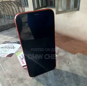 Photo - Apple iPhone 12 64 GB Red