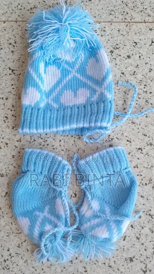 Photo - Baby Cap and Socks Made From Knitting Yarn