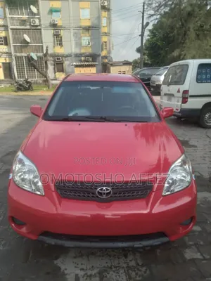Photo - Toyota Matrix Hatchback AWD (1.8L 4cyl 4A) 2006 Red