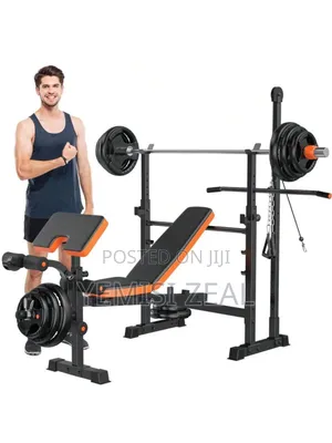 Commercial Weight Lifting Bench and Olympic Weight Plates