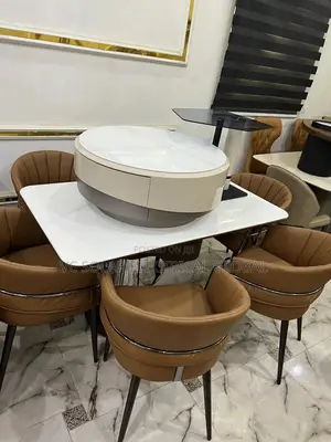 White Marble Dining Set With Brown Leather Chairs .