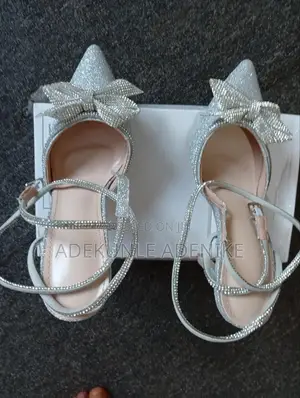 Affordable Elegant Lady's High-heeled Pointed Slivery Shoe.