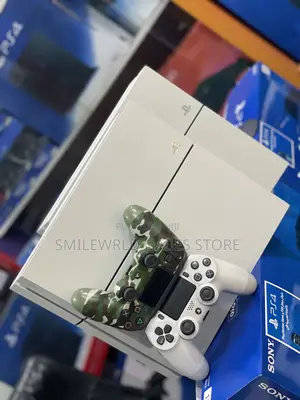 White Ps4 Game With 2 Pads and 12 Games Installed
