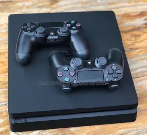 Ps4 Slim With 2 Pads And 20 Games