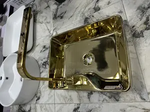 Gold Countertop Basin With Gold Mixer