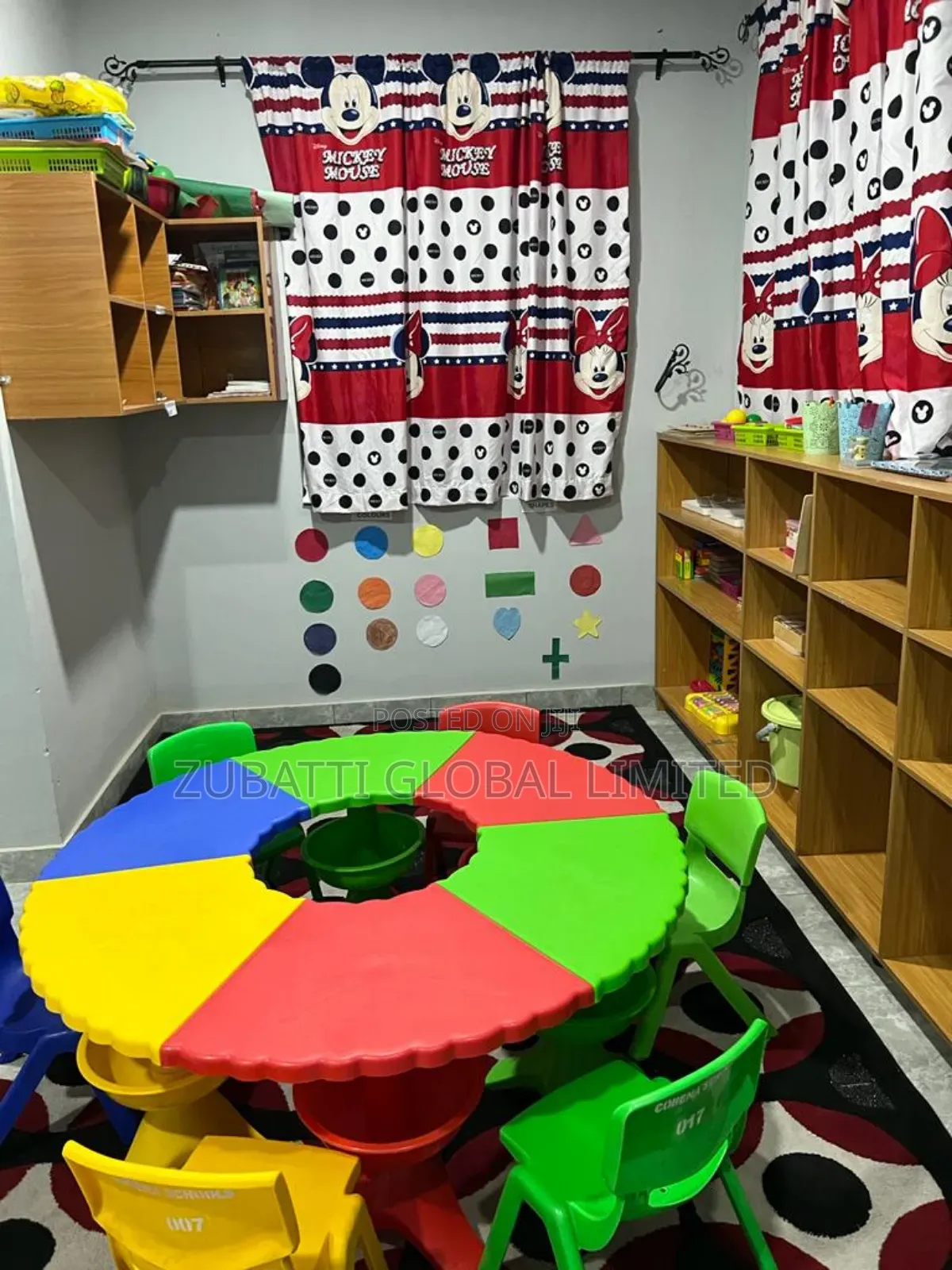 Kindergarten Children Studying Round Table