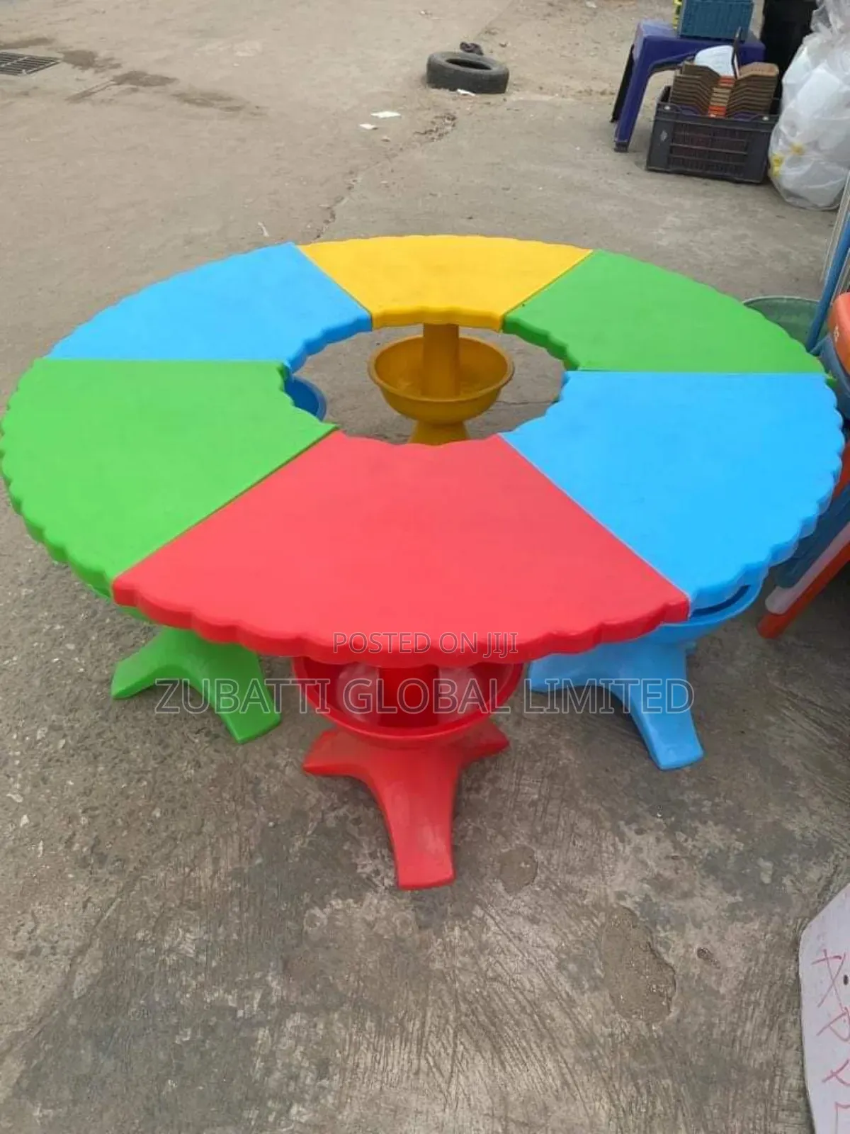 Kindergarten Children Studying Round Table