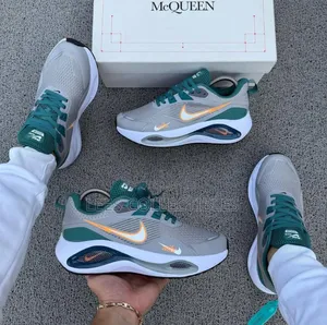 Photo - Best Quality Nike Unisex Net Sole Sneakers