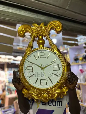Tusk Wall Clock- Gold . A Statement Wall Clock.