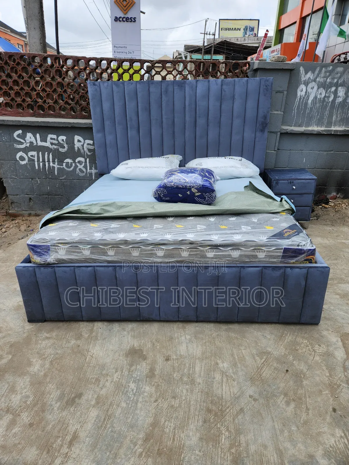 Standard Six by Six Grey Bed.