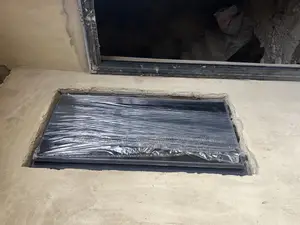 Gray Colored Frameless Window