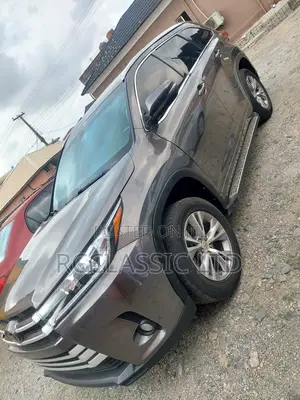 Toyota Highlander XLE V6 4x4 (3.5L 6cyl 6A) 2016 Beige