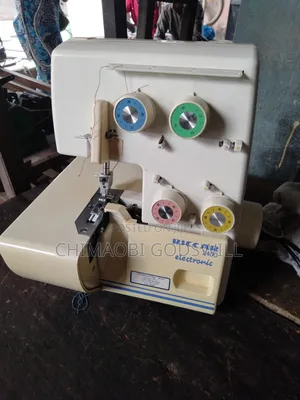 Photo - Electric Table Four Thread Weaving Machine
