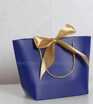 Elegant Gift Bag With Golden Ribbon Bow
