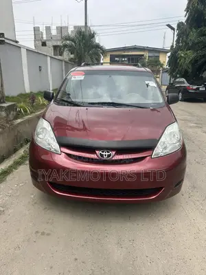 Photo - Toyota Sienta 1.5 FWD 2006 Red