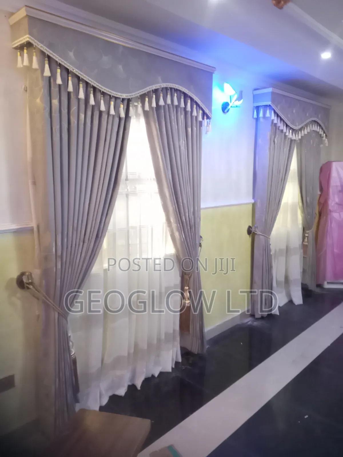 Gray Curtain With Rings and Board