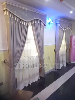 Gray Curtain With Rings and Board