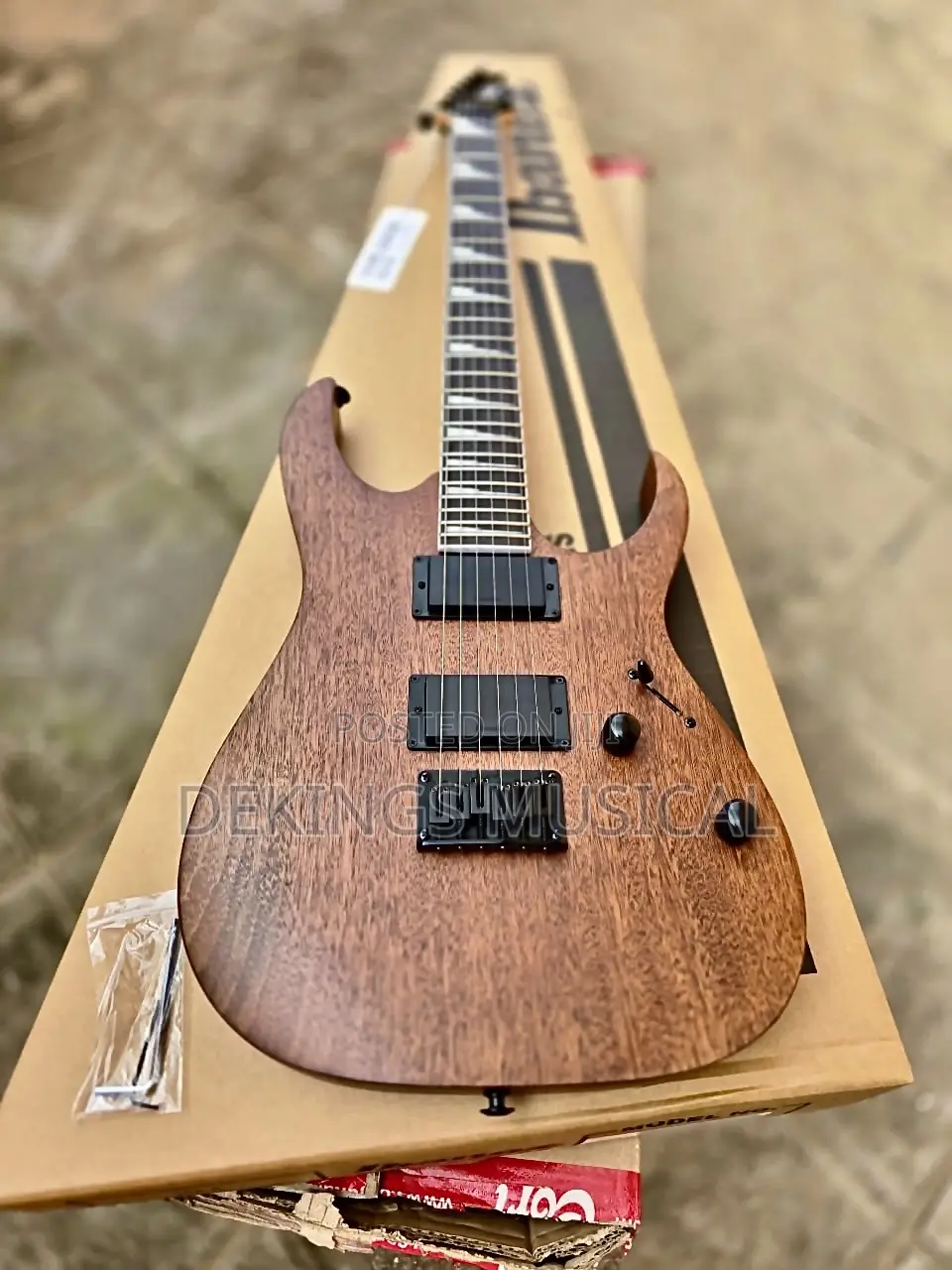Ibanez Grg121dx Electric Guitar in a Walnut Flat Finish.