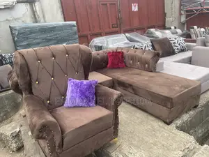 A Brown Velvet L Shape Chesterfield Couch
