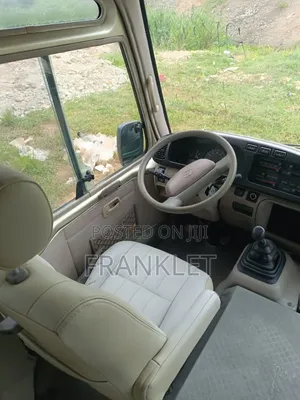 Toyota Coaster 2014 Gold