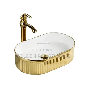 White and Gold Ceramic Countertop Basin