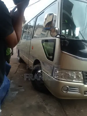 Toyota Coaster 2015 Gold
