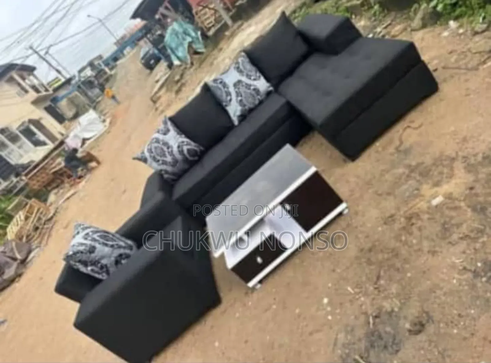 L-Shaped Fabric Sofa With a Single and a Center Table