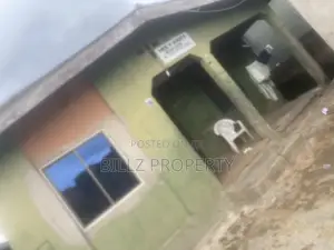 12 Rooms on a Half Plot of Land in a Serene Environment