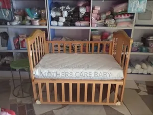 Photo - Wooden Baby Bed