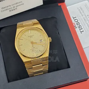 Tissot Yellow Gold Watch