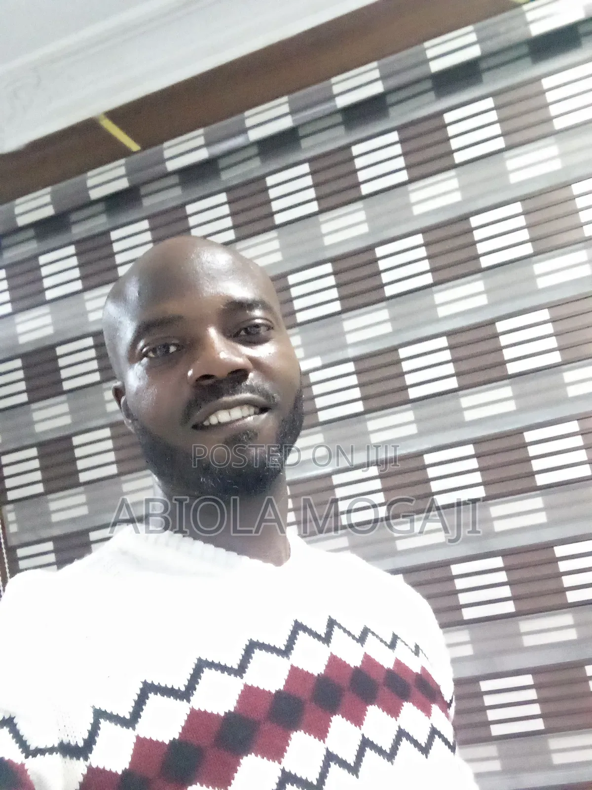 Mr Abiola Mogaji