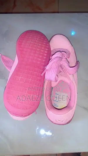 Photo - Puma Pink Suede Sneakers
