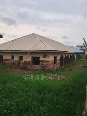 A Land With an Old Demolisbale Building at Ijegun Good Deal
