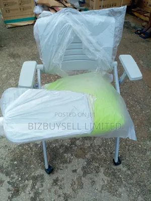 Executive Folding and Moveable Chair With Writing Pard.
