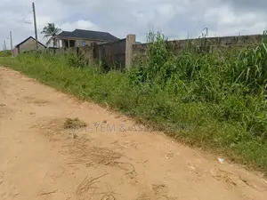 One Acre and a Plot of Land(7 Plots)Fenced Round With Cofo