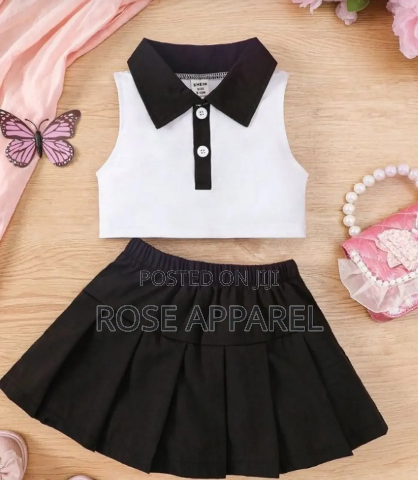 A Skirt and Armless Collared Top