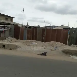 Multi-Useful Commercial Plot Facing Tarred Road at Agege