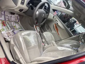 Toyota Corolla LE 4dr Sedan (1.8L 4cyl 4A) 2010 Red