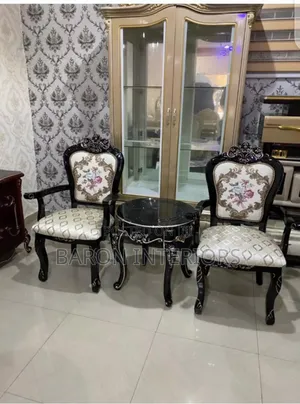 Two Sofa Chair With One Side Table Is Available as Seen