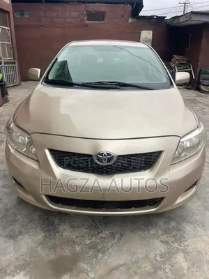 Toyota Corolla LE 4dr Sedan (1.8L 4cyl 4A) 2010 Gold
