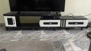Imported Tv Stand With Glass Top and Drawers
