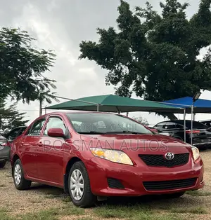 Photo - Toyota Corolla LE 4dr Sedan (1.8L 4cyl 4A) 2010 Red