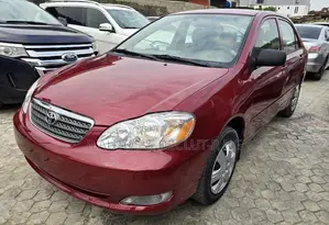 Photo - Toyota Corolla LE 2006 Burgundy