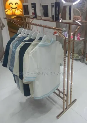 Double Sided Rose Gold Cloth Rack Display Stand