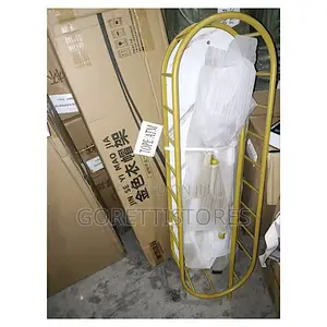 Gold Cloth Rack With Storage Space