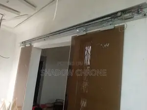 Double Panel Sliding Door-motorized Overhead Track System.