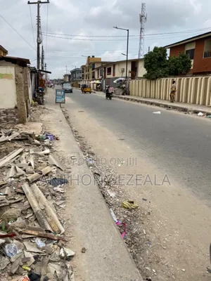 Empty Dry Plot of Land for Sale at Office Ago Palace Way.