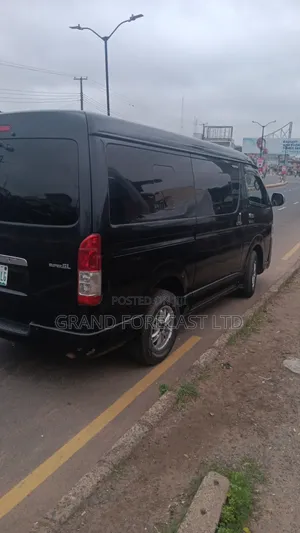 Black Executive Bus for Hire by Grand Forecast