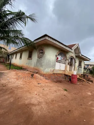 50/100 With 8bedroom Bungalow on It at Isihor Naira