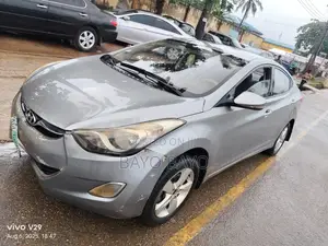Photo - Hyundai Elantra GLS Sedan FWD (1.8L 4cyl 6A) 2013 Gray
